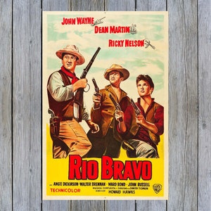 May include: A vintage movie poster for the film "Rio Bravo" starring John Wayne, Dean Martin, and Ricky Nelson. The poster features a yellow background with a scene of the three actors in cowboy attire holding guns.