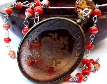 1930s Art Deco Smoky Glass Floral Pendant Orange Glass Necklace: Antique Jewellery