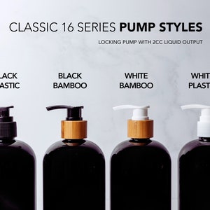 four bottles of black soap with pump on them