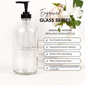 May include: A clear glass bottle with a black pump dispenser. The bottle is labeled "LOTION" and is part of an engraved glass series. The bottle is eco-friendly, has permanent labeling, and is designed, engraved, and assembled in the USA.