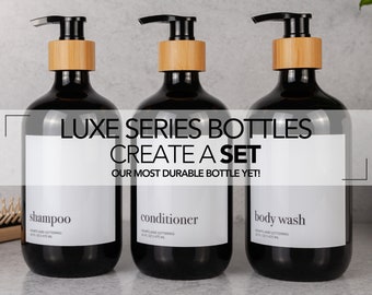 Reusable Modern Shampoo, Conditioner, Body Wash, Face Wash, Lotion, Soap Dispenser Bottle | Minimalist Black Bamboo Bathroom Decor Set