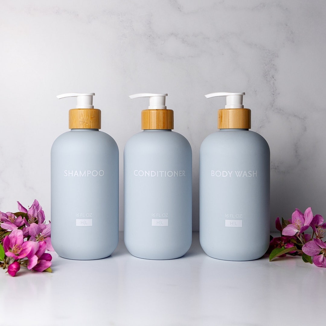 Matte Blue Shampoo Conditioner Bottles with Bamboo Pumps: Blue Bathroom Accessories For A Spa Decor