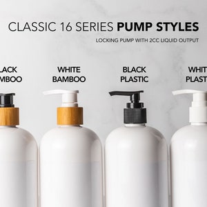 a group of three white bottles with black and white soap dispensers