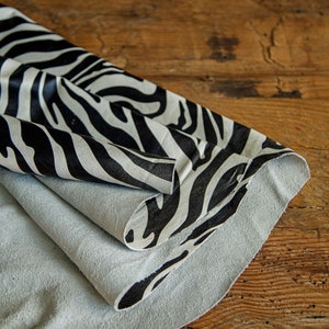Gelooid leer met zebraprint, echt rundleer, volnerfleer en dierenhuid