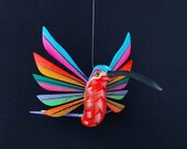 Beautiful oaxacan wood carving hanging hummingbird alebrije. Mexican folk art