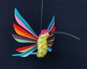 Beautiful oaxacan wood carving hanging hummingbird alebrije. Mexican folk art