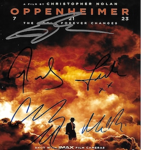May include: A film poster for the movie "Oppenheimer" featuring a fiery orange and yellow background. The title of the film is in large white letters. The names of the actors are listed at the top of the poster. The poster also includes the text "A film by Christopher Nolan" and "Shot with IMAX film cameras".