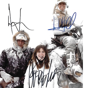 Great Looking Movie 8x10 Photograph Signed by Harrison Ford, Hamill, and Fisher.