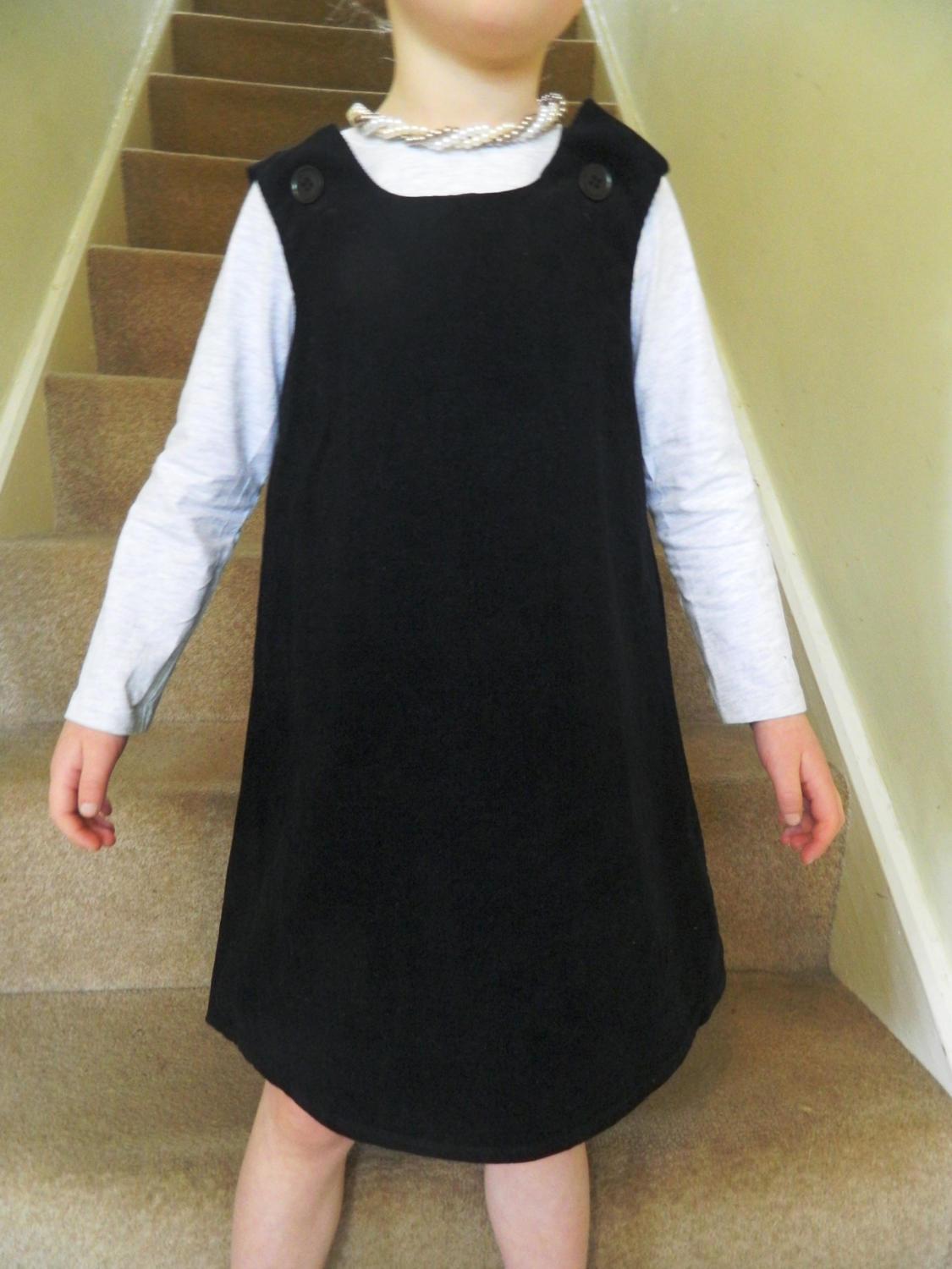 My first little cheap black dress for baby