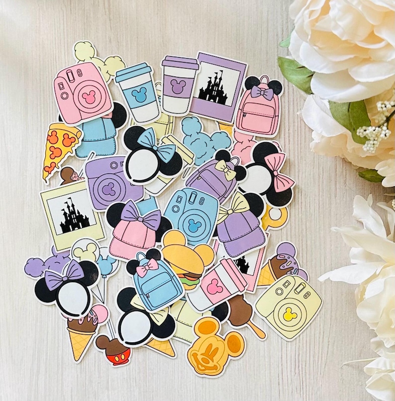 May include: A collection of colorful stickers featuring various Disney-themed designs, including Mickey Mouse ears, a castle, a camera, a backpack, and a coffee cup. The stickers are perfect for adding a touch of Disney magic to your planner, laptop, or water bottle.