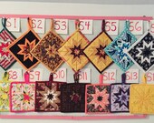 Amish folded star potholders, trivets, hot pads