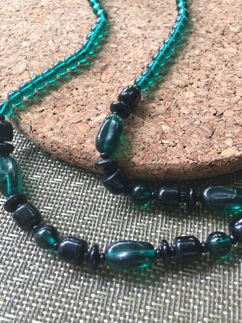 VINTAGE vintage but never worn 18 inches black and green glass beads in this necklace ....