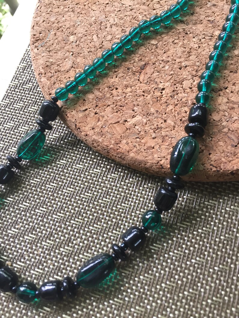 VINTAGE vintage but never worn 18 inches black and green glass beads in this necklace ....