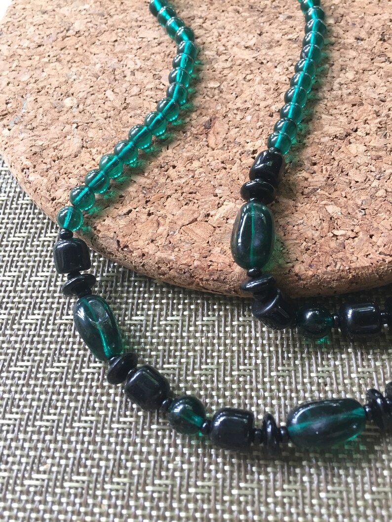 VINTAGE vintage but never worn 18 inches black and green glass beads in this necklace ....