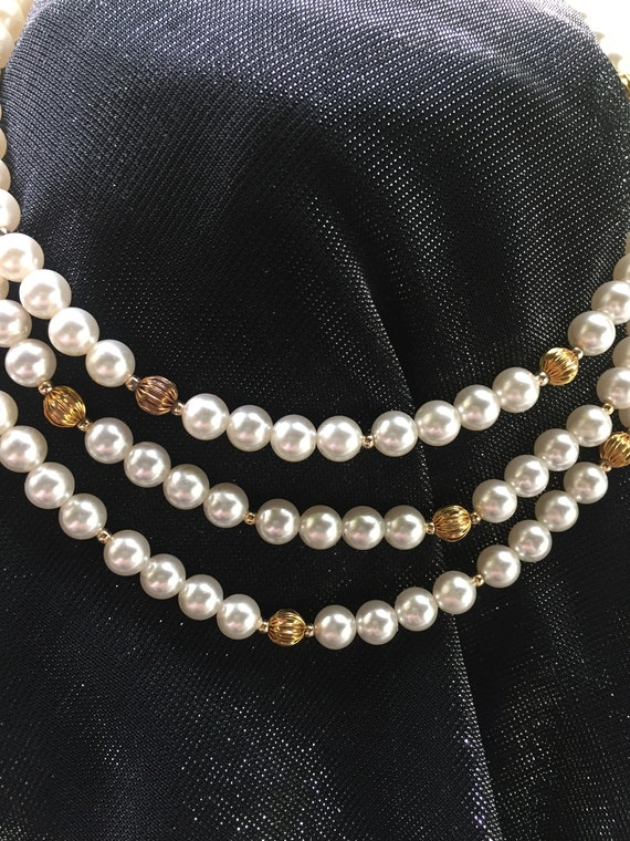 VINTAGE -3  strands of white pearls accented with 