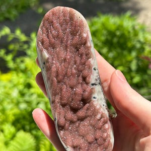 Red galaxy amethyst palmstone