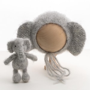 Newborn photography props. Knitted hat and toy. Elephante.