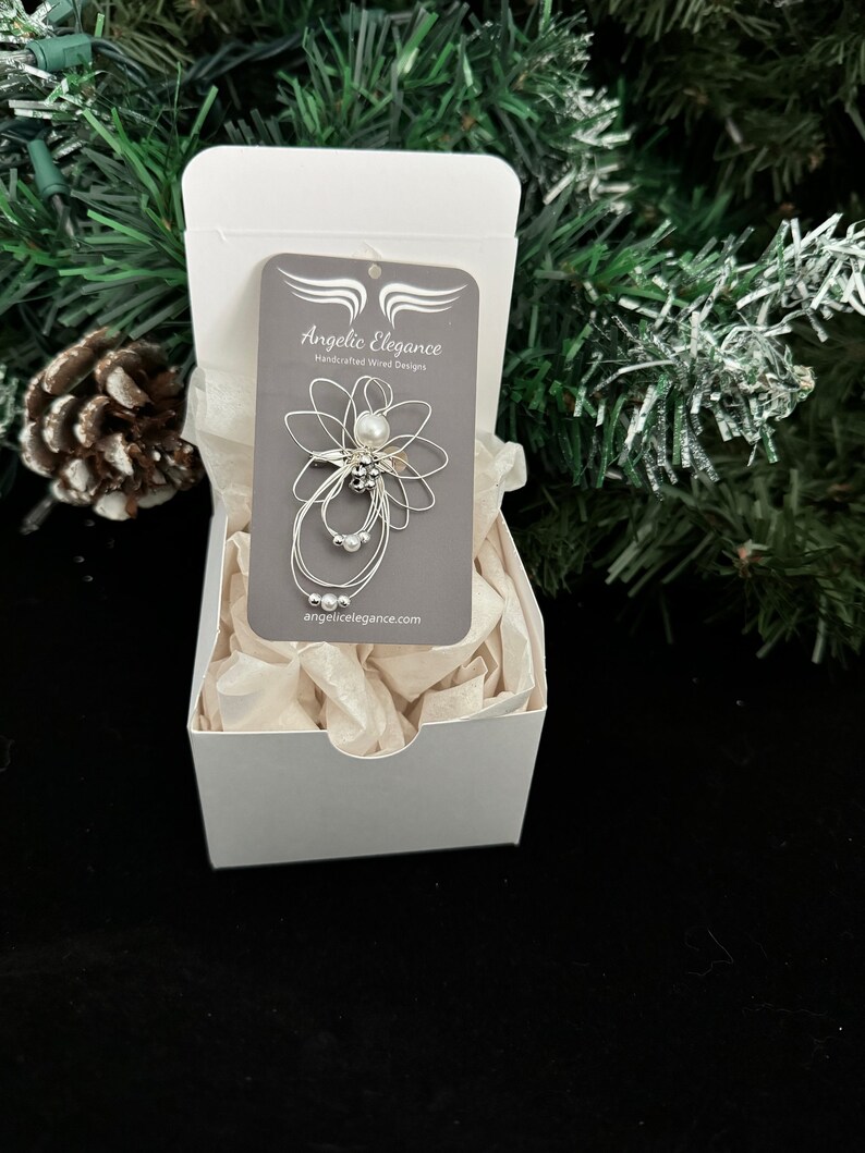 1.5-inch Handcrafted Silver Wire Angel Necklace - accented with silver and white beads. Elegant Heavenly Charm - Unique Gift for Her in a gift box.