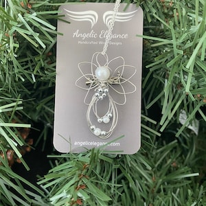 1.5-inch Handcrafted Silver Wire Angel Necklace - accented with silver and white beads. Elegant Heavenly Charm - Unique Gift for Her