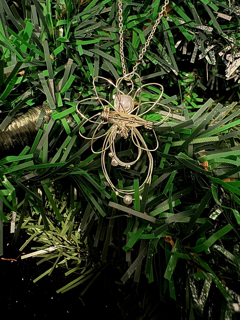 Back of 1.5-inch Handcrafted Silver Wire Angel Necklace - accented with silver and white beads. Elegant Heavenly Charm - Unique Gift for Her