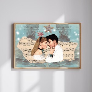 May include: A framed art print featuring a vintage collage. The artwork depicts a couple in a romantic embrace, set against a backdrop of sheet music, ships, and celestial elements. The color palette includes blues, beige, and touches of red.
