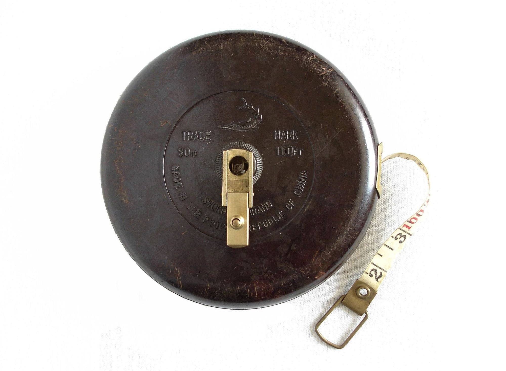 Fabric Measuring Tape in a Bakelite Frame. - Gilai Collectibles