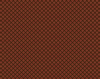 May include: A brown background with a repeating pattern of small red and gold squares.