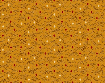 May include: Mustard-colored fabric with a repeating pattern of small, dark brown dots and scattered red and off-white diamond shapes. The design has a textured appearance, creating a visually interesting surface.