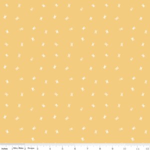 Puede incluir: Una tela amarilla con un patrón blanco repetido de carretes de hilo. La tela tiene 12 pulgadas de ancho.