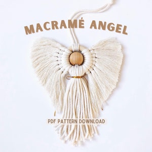 May include: A white macrame angel ornament with a wooden bead head and gold trim. The ornament is hanging from a string and the text "MACRAMÉ ANGEL" is written above it. The text "PDF PATTERN DOWNLOAD" is written below the ornament.