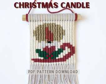 May include: A Christmas candle pattern for macrame wall hanging. The pattern features a red and green candle with a gold top and a red bow. The pattern is available as a PDF download.