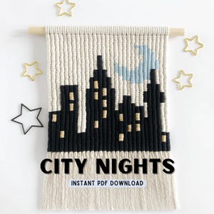 May include: A beige and black yarn wall hanging with a city skyline design and a blue crescent moon. The text "CITY NIGHTS" is printed below the image. The text "INSTANT PDF DOWNLOAD" is printed below the title.