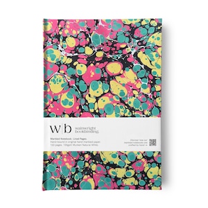 May include: A lined notebook with a marbled cover design. The cover displays a pattern of pink, teal, yellow, and black swirls. The notebook is hand-bound and contains 160 pages of 100gsm Munken Natural White paper. The brand name "wainwright bookbinding" is printed on the cover.