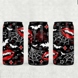 May include: Three black and white patterned beverage cans with a red and white vampire mouth design. The pattern includes bats, stars, and spiderwebs.