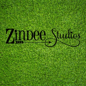 May include: Black text on a green grass background reads "Zinpee Studios" with an arrow pointing to the right.