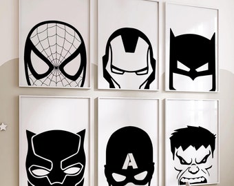 May include: Six black and white framed prints of superhero masks. The masks include Spiderman, Iron Man, Batman, Black Panther, Captain America, and the Hulk.