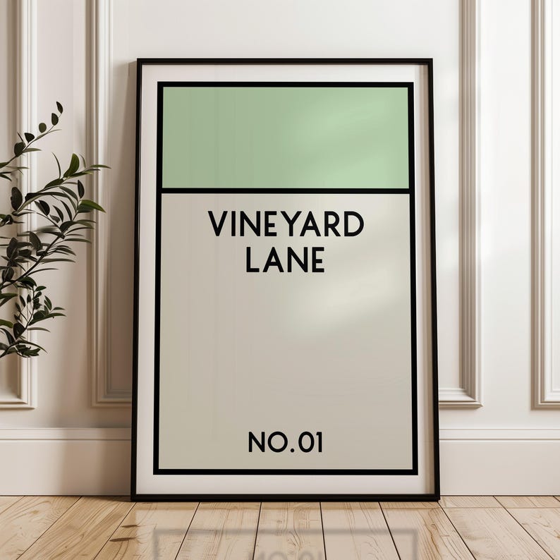 May include: A black framed print with a white background and black text that reads "Vineyard Lane NO.01". The top portion of the print is a light green rectangle.