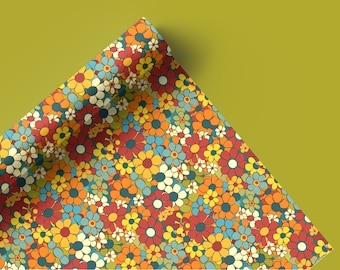 May include: A sheet of colorful wrapping paper with a retro floral pattern. The paper is folded over on itself, revealing the pattern.