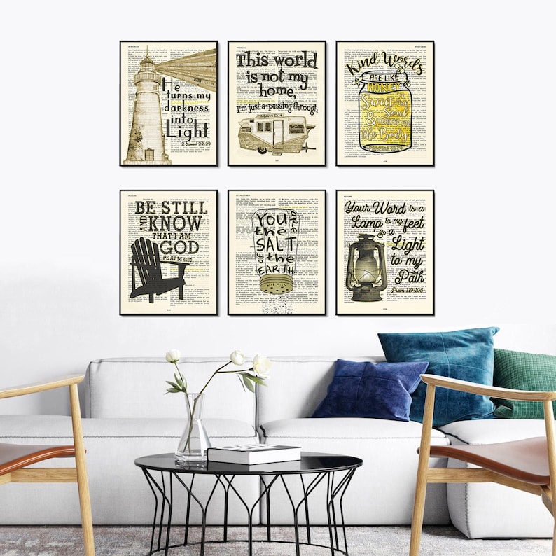 May include: Set of six vintage-style prints with inspirational quotes and images. The prints feature a lighthouse, a camper, a mason jar, a chair, a salt shaker, and a lantern. The quotes include "He turns my darkness into light", "This world is not my home", "Kind words are like honey", "Be still and know that I am God", "You are the salt of the earth", and "Your word is a lamp to my feet and a light to my path".