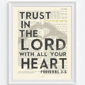 May include: A vintage-style printable wall art design featuring a Bible verse from Proverbs 3:5. The text is in black and white, with a yellow highlight on the verse number. The background is a cream color.