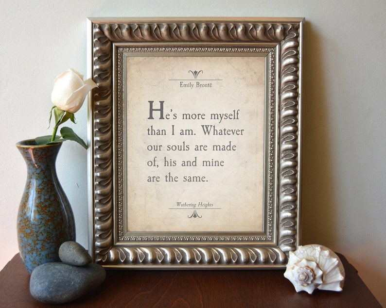 May include: A framed print with a quote from Emily Bront&euml;'s *Wuthering Heights*: "He's more myself than I am. Whatever our souls are made of, his and mine are the same."