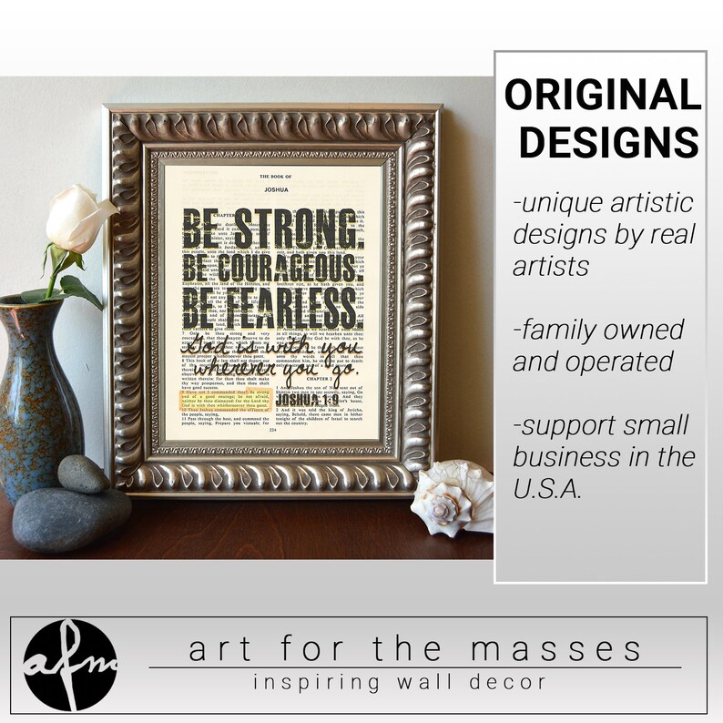May include: A framed print with a vintage book page background featuring the text "BE STRONG. BE COURAGEOUS. BE FEARLESS. God is with you wherever you go. JOSHUA 1:9". The frame is silver with a decorative border.