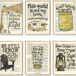 May include: Set of six printable wall art prints featuring inspirational bible verses and imagery. The prints feature a lighthouse, a camper, a jar of honey, a chair, a salt shaker, and a lantern. Each print has a different verse from the bible.