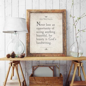May include: A framed print with a quote by Ralph Waldo Emerson: "Never lose an opportunity of seeing anything beautiful, for beauty is God's handwriting."