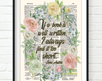 May include: Framed art print featuring a quote by Jane Austen, "If a book is well written, I always find it too short." The quote is surrounded by a watercolor floral wreath in pastel colors. The background is a vintage dictionary page.