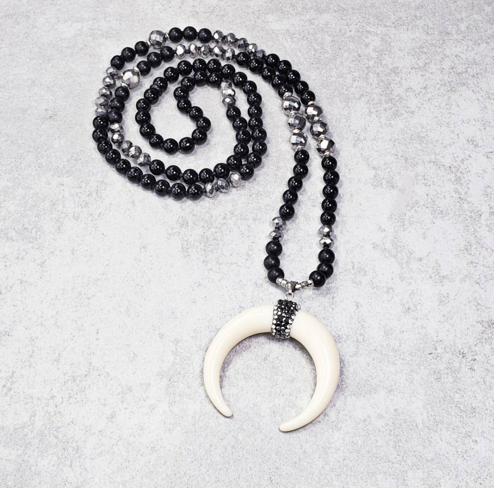 Elongated single horn pendant necklace main image 1