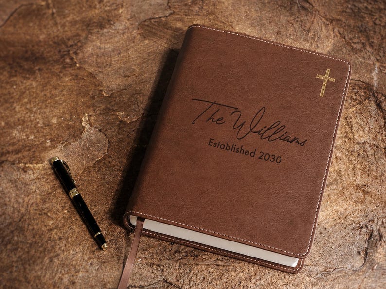 Personalized Bible with custom family name and leatherette cover, designed as a wedding guestbook and meaningful Christian keepsake.