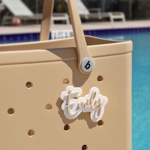 Customize your Bogg Bag with a durable acrylic name charm white and bone Bogg Bag Bits, 
Bogg Bag Buttons,
tag for bogg bag,
bogg bag name tag,
custom name tag,
luggage tag,
bogg bag accessories,
custom name bogg bag,
bogg bag Jibbitz
Personalized Bag, Unique Bogg Bag gift idea – custom acrylic name charm for Crocs-style tote bags
Stylish Bogg Bag name plate – personalized charm for organizing and accessorizing your bag