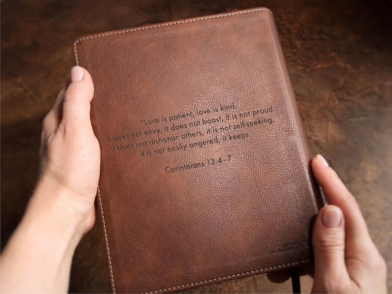 Custom family Bible NIV edition engraved with last name and date, styled as wedding table decor. Personalized leather wedding Bible guest book for Christian wedding, bridal shower gift, religious anniversary gift.