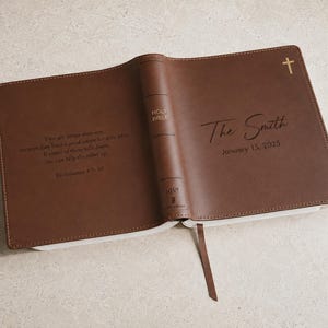 Custom Bible wedding guest book personalized with the couple’s name, ideal as a religious wedding gift, baptism gift, or family Bible.